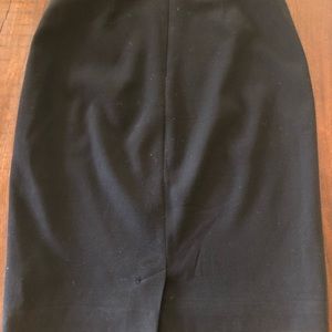 Black Harvard one skirt by St. John Collection.